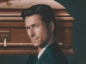 Glen Powell carrying a coffin in a still from 'How to Make a Killing' - and SWITCH is giving you the chance to win double passes!