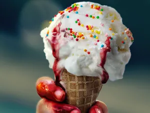 An ice cream with red liquid dripping from it. A still from the new horror 'Ice Cream Man' - and SWITCH is giving you the chance to win a double pass!